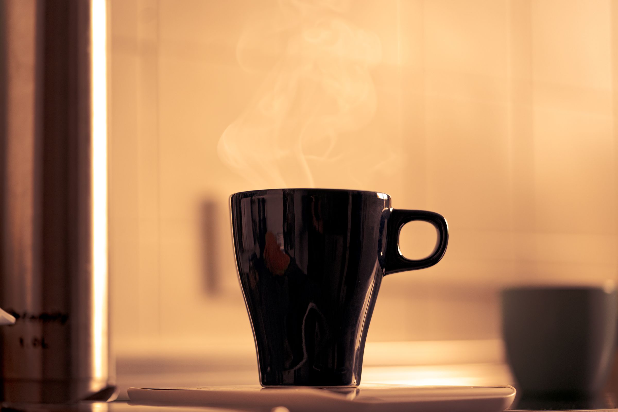 Coffee steam in warm backlight